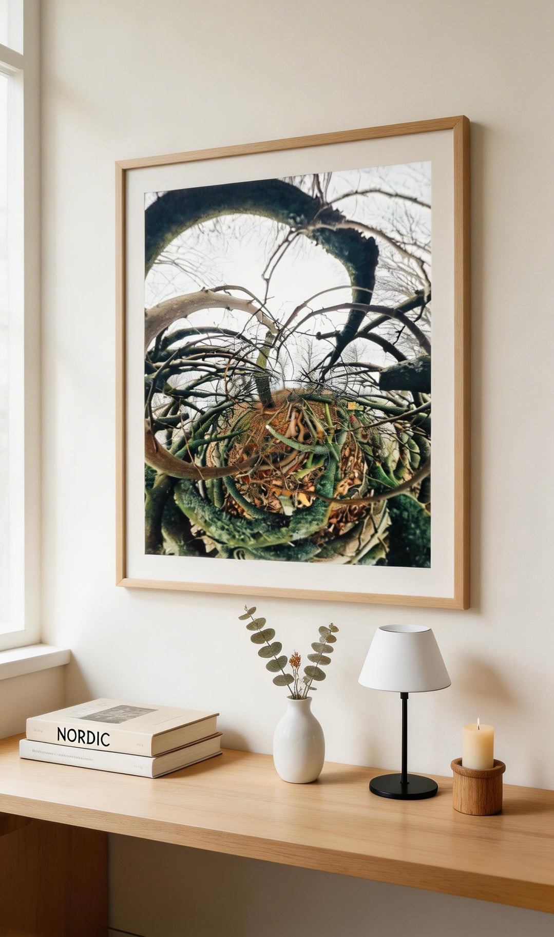 The Complete Collection — Nordic nature print framed above desk, NORDIC book on shelf